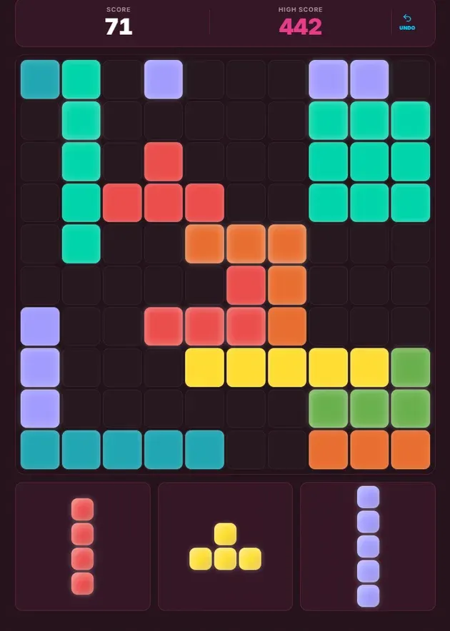 Plokk grid with brightly colored blocks and a score display