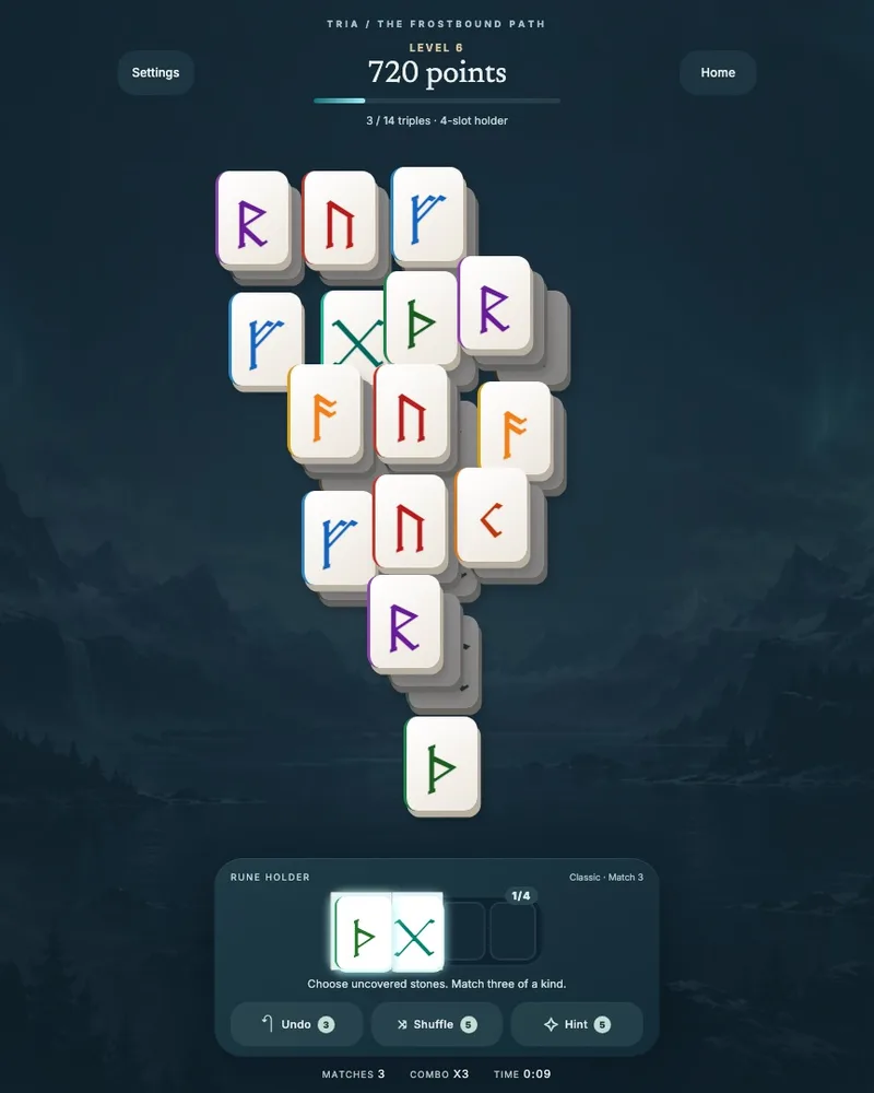 Tria development build: stacked rune stones above a partly filled tray